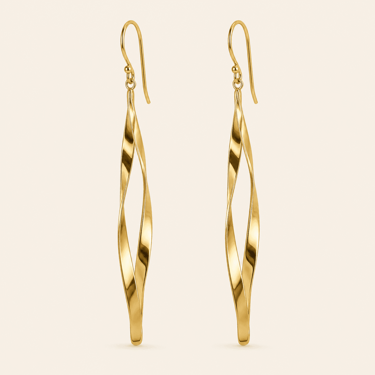 Pair of polished gold-tone twisted drop earrings from Aurnelia